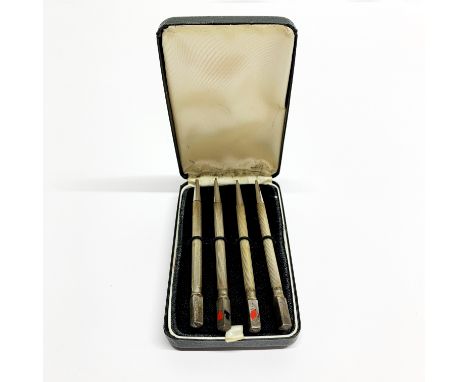 A set of four sterling silver bridge pencils, L. 9cm.