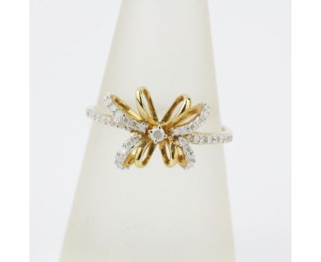 A hallmarked 9ct yellow gold diamond set bow shaped ring, (O).