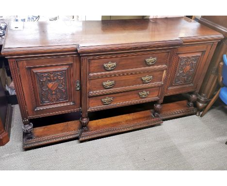 A large carved mahogany mirror backed sideboard, one column loose, overall 238 x 186 x 65cm.