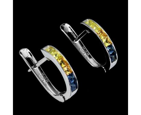 A pair of 925 silver earrings set with step cut sapphires and yellow sapphires, L. 1.3cm.