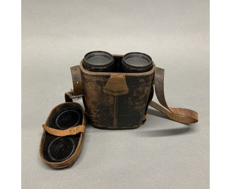 A leather cased pair of French Lemaire Fab't theatre and field glasses.