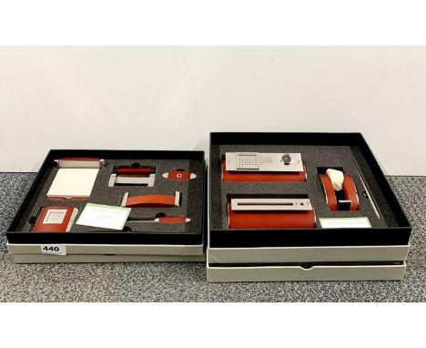 Three boxed desk gift sets.