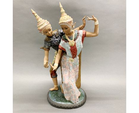 A large Lladro figure of Thai dancers, H. 53cm. (a/f to one finger).