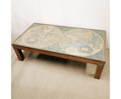 A vintage metal and wood, World map and glass topped coffee table, 132 x 68 x 36.5cm.