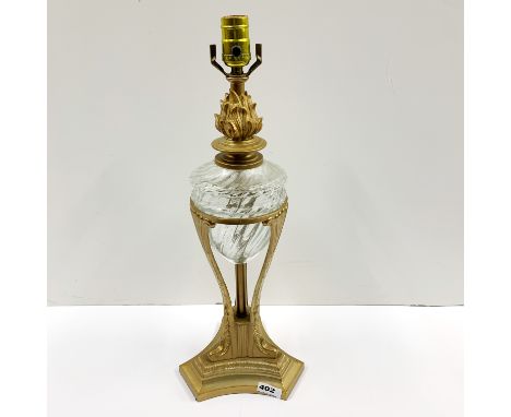 A gilt metal and glass table lamp base, H. 54cm.