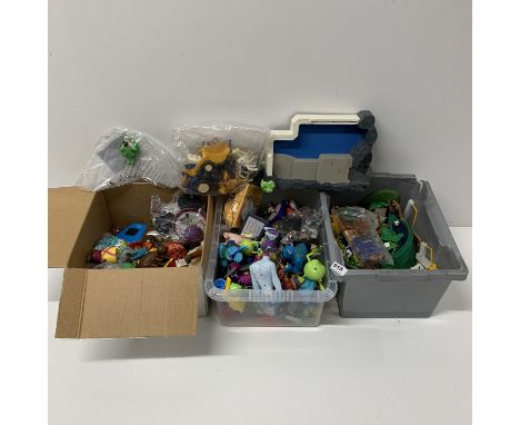 A quantity of toys, including Monsters inc, Playmobil, etc.