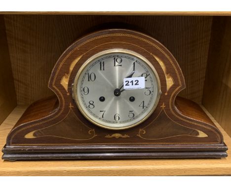 A 1920's mother of pearl inlaid mahogany mantle clock, W. 46cm. Appears to be in working order but not tested.