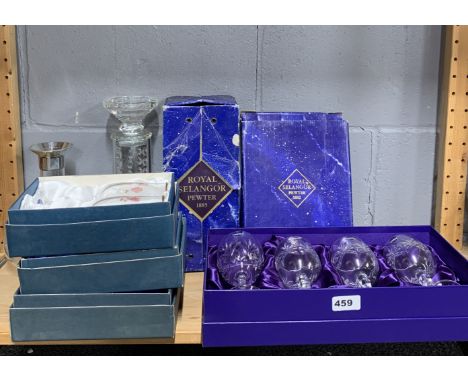 A boxed set of Edinburgh Crystal wine glasses and other glass items.