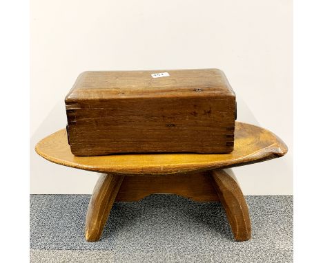 A heavy oak portable cash box, W. 36cm, together with a small stool/table.