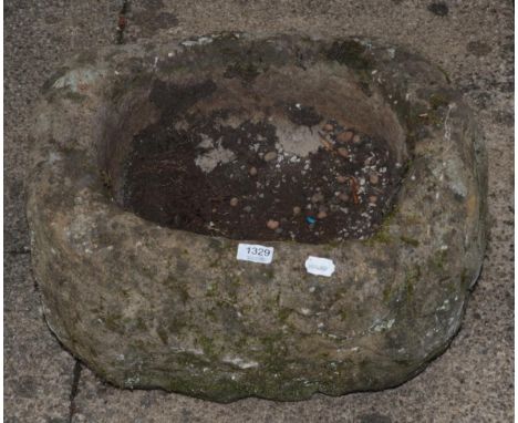 Small stone trough of oval form 
