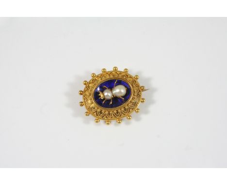 A VICTORIAN GOLD, ENAMEL AND PEARL SET BROOCH the centre section of blue enamel is mounted with a pearl set bee within a gold