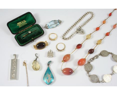 A QUANTITY OF JEWELLERY including a diamond and gold bar brooch, 4cm. long, an agate bead necklace, a five stone pearl ring, 