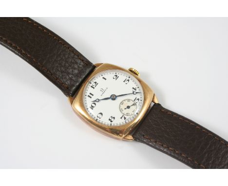 A GENTLEMAN'S GOLD WRISTWATCH BY OMEGA the signed circular white enamel dial with Arabic numerals and subsidiary seconds dial