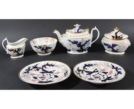 ENGLISH PORCELAIN PART TEA AND COFFEE SERVICE, circa 1820-30, painted in the imari palette with flowering plants, comprising 