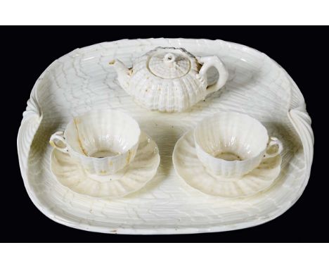 BELLEEK TRIDACNA PART TEA SET, 1st period, comprising tray, teapot and a cover, two cups and saucers, in white, black printed