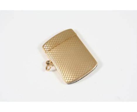 A 9CT. GOLD MATCH CASE with engine turned decoration to both sides, 4.5 x 3.3cm.,16.6 grams.