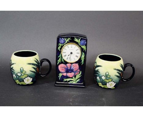 MOORCROFT CLOCK - ANEMONE a modern Moorcroft clock in the Anemone design, also with two special commission Moorcroft tankards