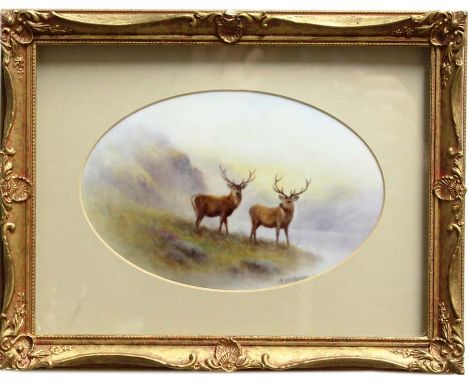 MILWYN HOLLOWAY (Royal Worcester Artist), Two stags in a highland setting, oval porcelain plaque, signed and printed mark ver