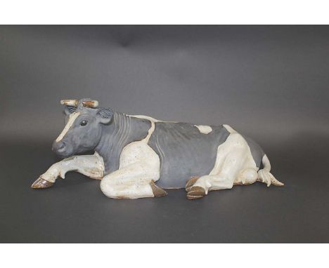 PIPPA HILL - SCULPTURE OF A COW a large stoneware sculpture of a Cow, with a small card with information about the sculptor. 
