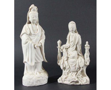 TWO CHINESE BLANC DE CHINE FIGURES OF GUANYIN, one seated with a bird and vase, height 20cm and 26cm; together with two Qianl