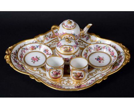 SEVRES CABARET SERVICE, circa 1793, comprising tray, teapot and cover, sucrier and cover, two cup and saucers, painted with v