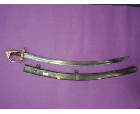 A British Napoleonic Infantry officer's sword 1803 pattern, with a gilt lion's head pommel, gilt hand guard with crowned G.R.