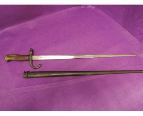 A French Gras rifle bayonet model 1874 with scabbard, inscribed 1875 