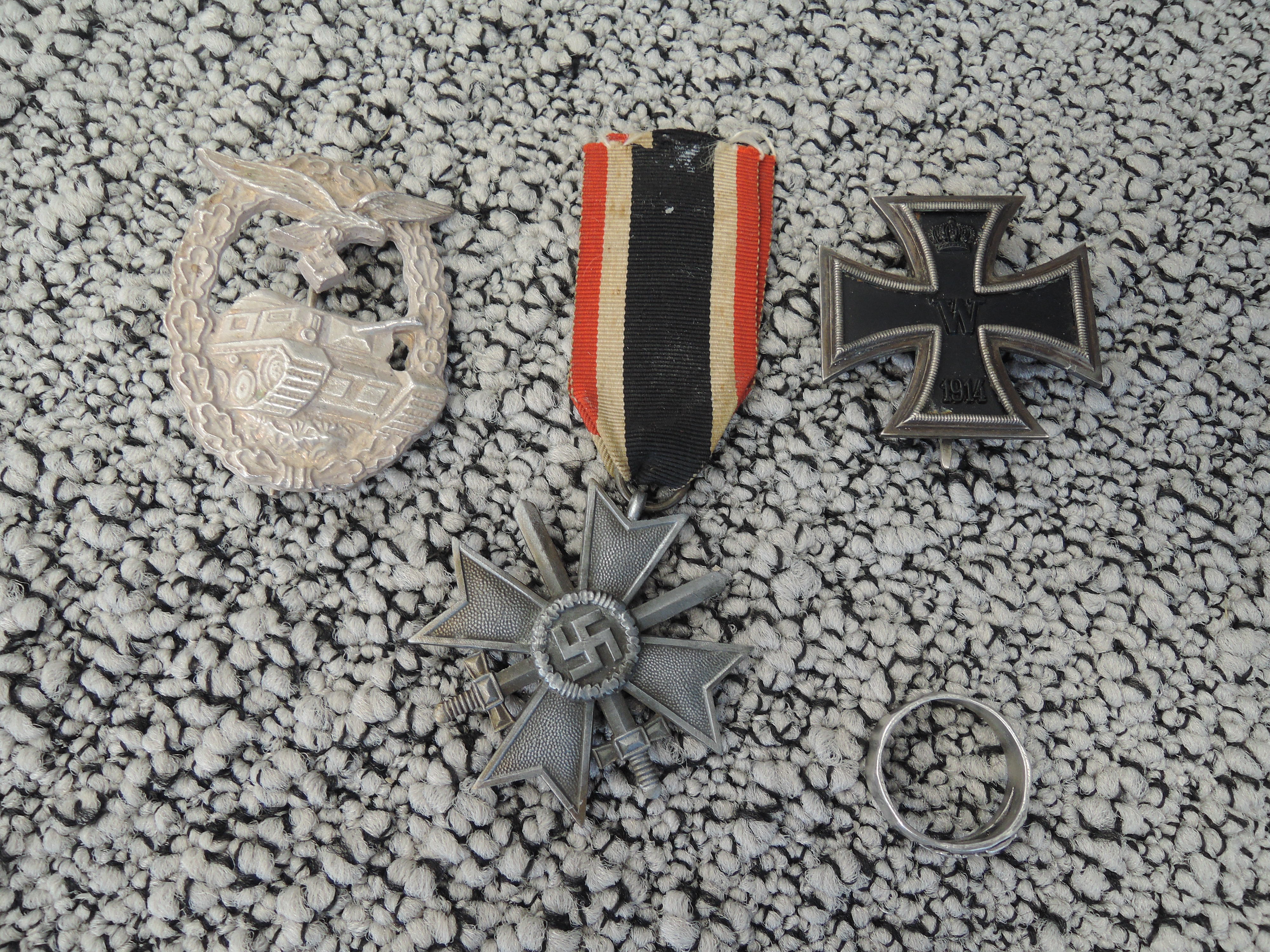 A collection of German military 1914 Iron Cross, 1939 Iron Cross