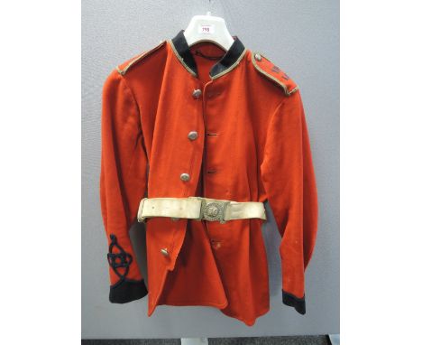 A Lancashire 19th Rifle Volunteer's red jacket and white leather belt with Lancashire 10th Rifle Volunteer's brass buckle