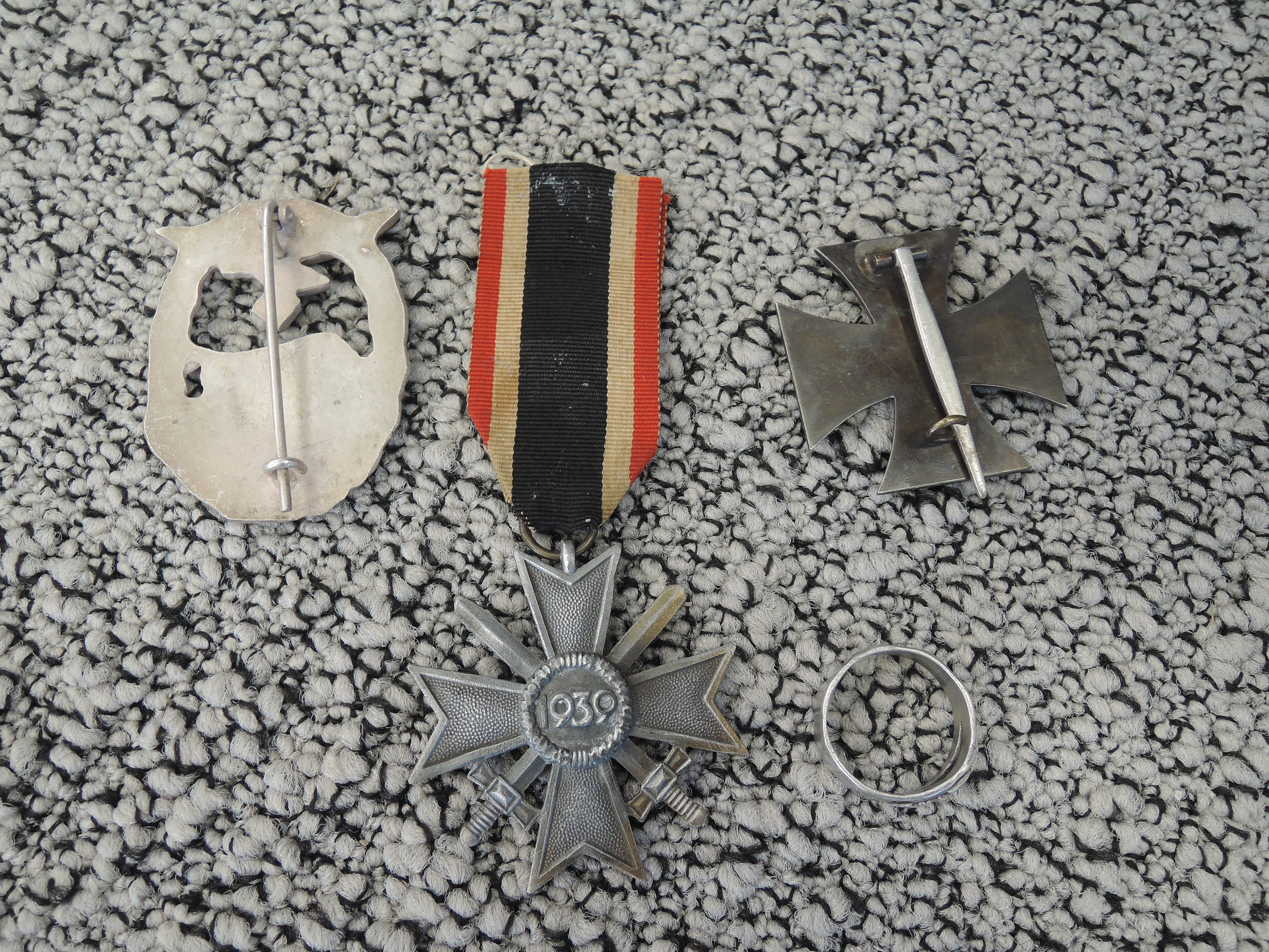 A collection of German military 1914 Iron Cross, 1939 Iron Cross