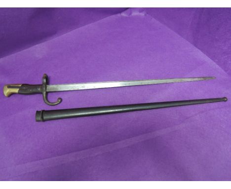 A French Gras rifle bayonet model 1874 with scabbard, inscribed 1880