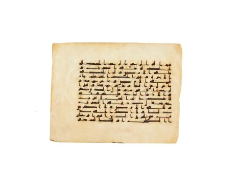 Leaf from a large Kufic Qur'an, in Arabic, illuminated manuscript on parchment [Abbasid territories of North Africa or possib