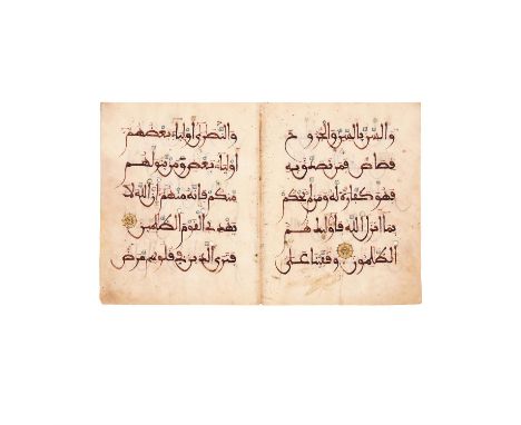 Bifolium from a fine Maghribi Qur'an, in Arabic, illuminated manuscript on parchment [Andalusia, twelfth century] single bifo