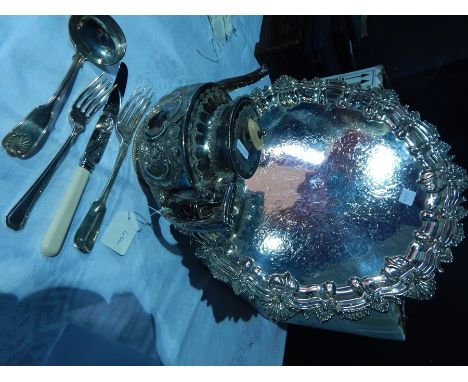 Box of silver plate to include: a circular tray, teapot and miscellaneous flatware
