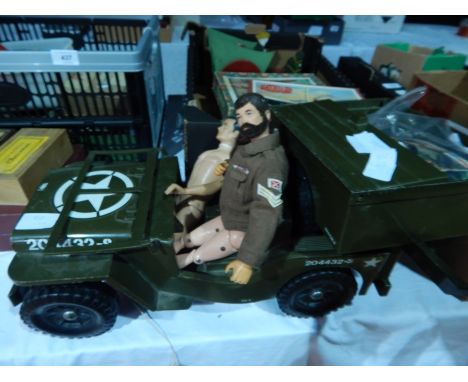 1960's/70's Action Man with various small accessories, clothing, another similar boy doll together with army jeep and trailer