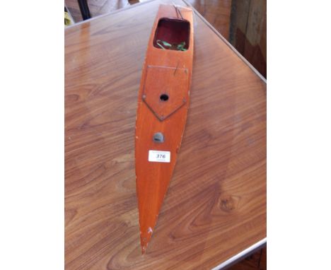 Kellner Toys clock work model speed boat, varnished mahogany body with red stripe to top and green hull, together with key, 6