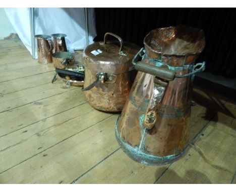 A hammered copper covered cauldron-type cooking pan with brass swing handle, large copper jug, smaller copper and iron saucep