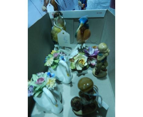 Three Wade figures, animal and bird models and floral encrusted decorative items 