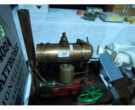 Stationary steam traction engine model mounted on board 