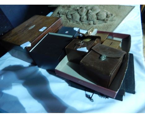 A collection of photograph albums, a sewing box, a hardstone lighter and other items 