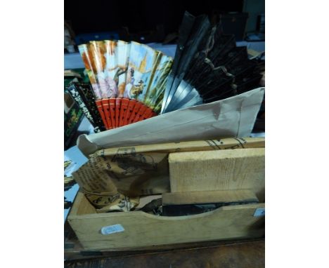 A quantity of fans, some printing tools, compass, camera items, sundry pens, gents watches and other items 