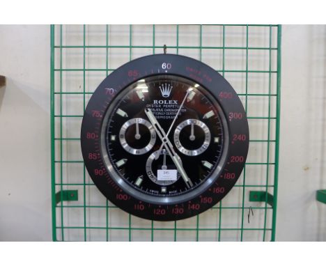 A Rolex style dealer's display wall clock 