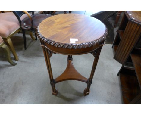A Chippendale style mahogany circular occasional table 