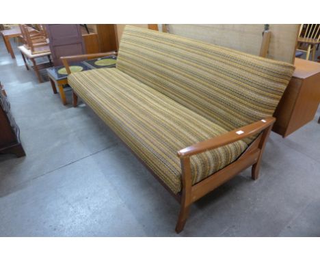 A Danish teak and fabric upholstered daybed sofa 