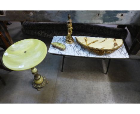 A brass and onyx effect occasional table, a wall shelf, a gilt cherub table lamp and a coffee table 