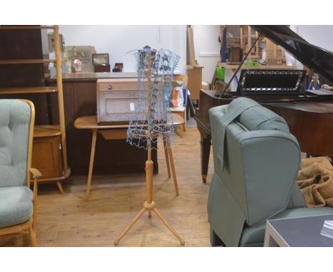 A 1970s ash tailor's dummy stand with central adjustable column with blue enamel wire mesh adjustable body, on tripod support
