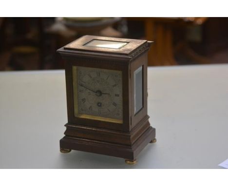 An Edwardian bracket style mahogany mantle clock by Sir John Bennett Ltd, Cheapside, London, complete with pendulum, key etc.