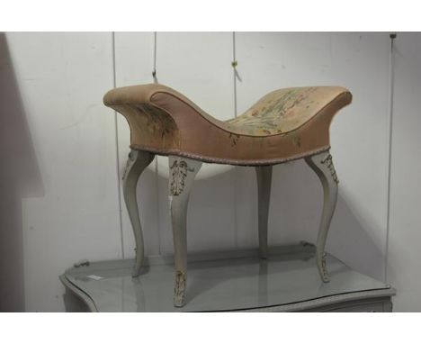 A vintage French boudoir style green painted and gilt dressing stool. 43cm by 53cm by 36cm