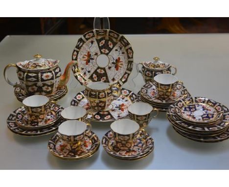 A Royal Crown Derby thirty four piece coffee set including sucrier, cream jug, teapot (a/f), cake plates, side plates, six co