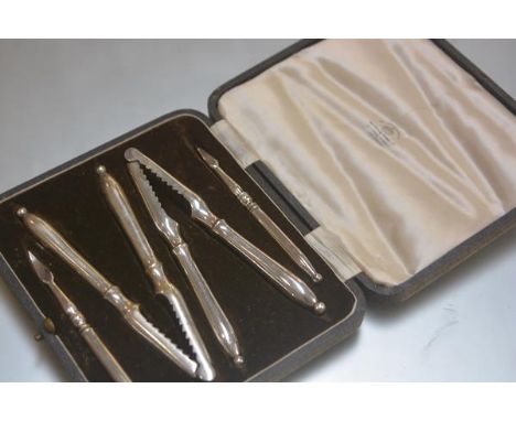 A pair of Mappin &amp; Webb lobster/crab cracks and picks in original fitted case